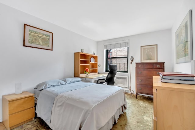 bedroom with a wall unit AC