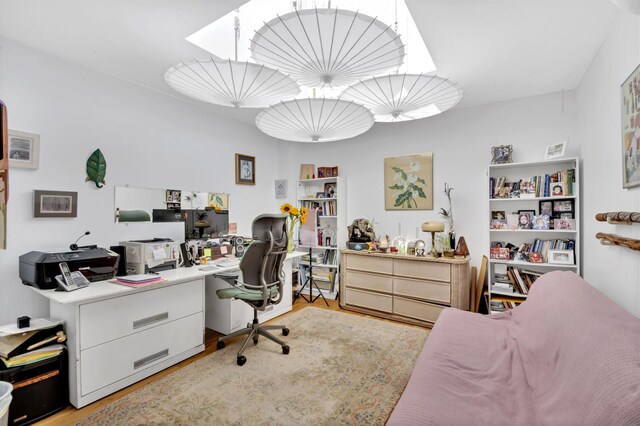 home office featuring light wood finished floors