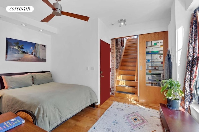 bedroom featuring visible vents and light wood finished floors