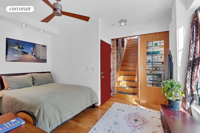 bedroom featuring recessed lighting, a ceiling fan, visible vents, and wood finished floors