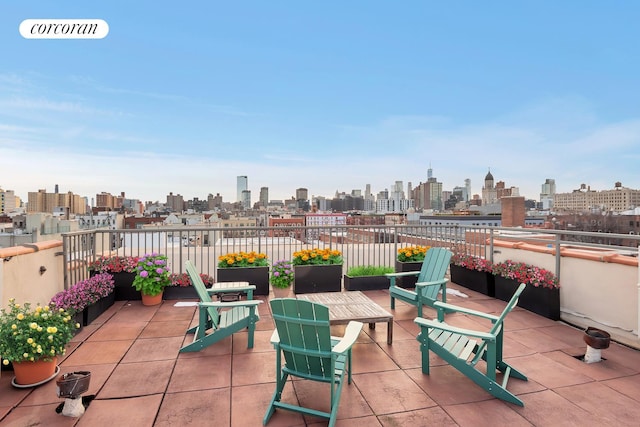 view of patio / terrace featuring a city view