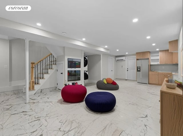 interior space with baseboards, visible vents, a wall mounted AC, recessed lighting, and marble finish floor