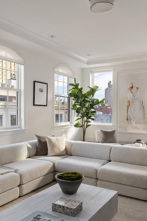 living room with crown molding