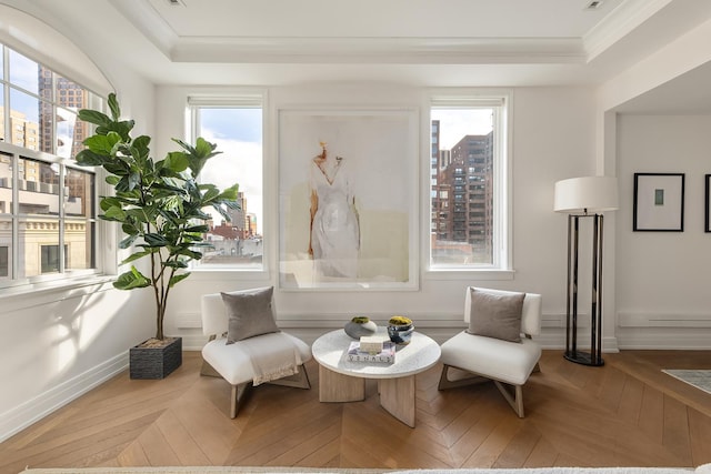 320 E 82nd Street Penthouse, New York City, NY 10028 - living area featuring a tray ceiling, a view of city, and ornamental molding