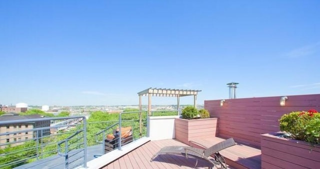 deck featuring a pergola