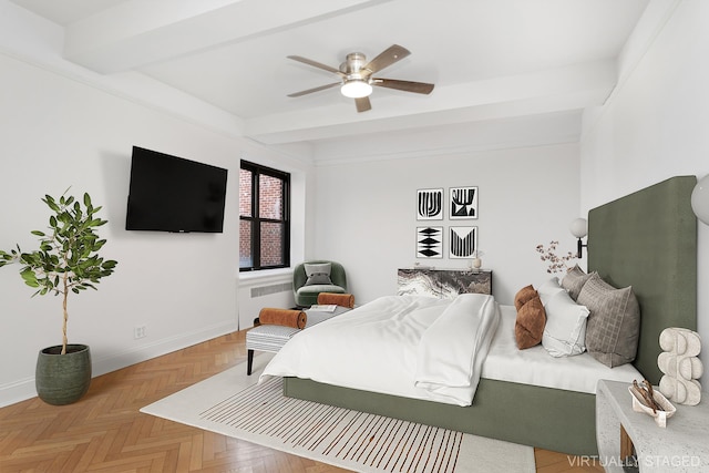 bedroom featuring a ceiling fan, radiator, beamed ceiling, and baseboards