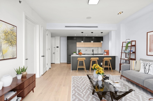 living area with light wood finished floors