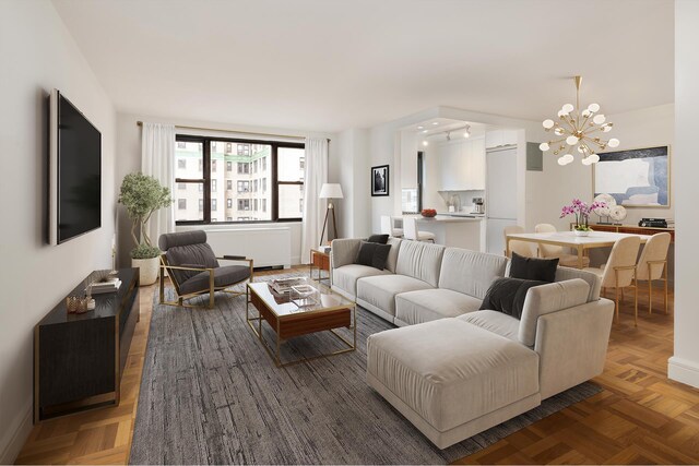 living room with a notable chandelier