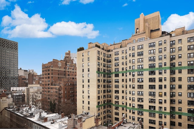 view of building exterior featuring a view of city