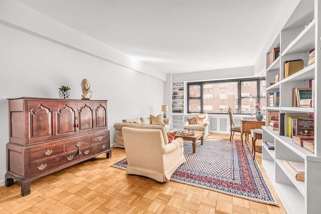 sitting room featuring light parquet flooring