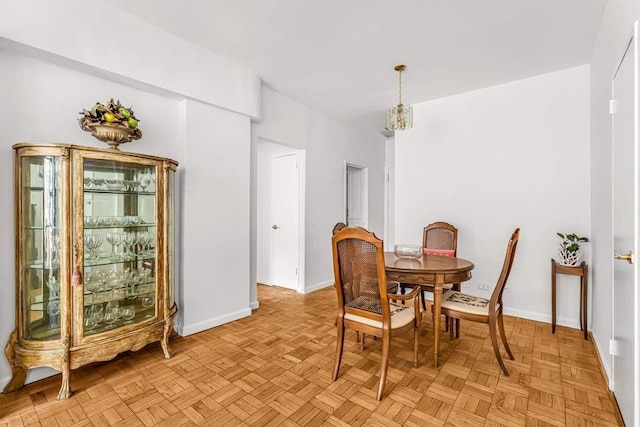 dining room with light parquet flooring