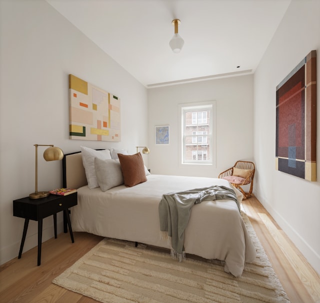 bedroom with light hardwood / wood-style floors