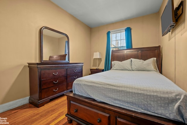 bedroom featuring light hardwood / wood-style floors