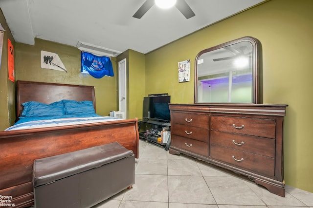 tiled bedroom with ceiling fan