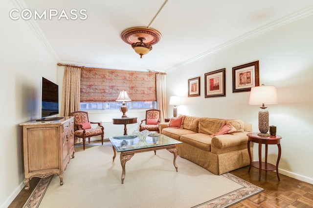 living area with ornamental molding and baseboards