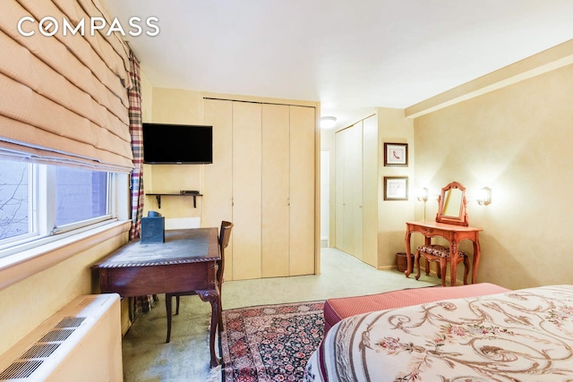 bedroom featuring radiator heating unit