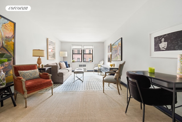 living room featuring carpet floors, baseboards, and visible vents