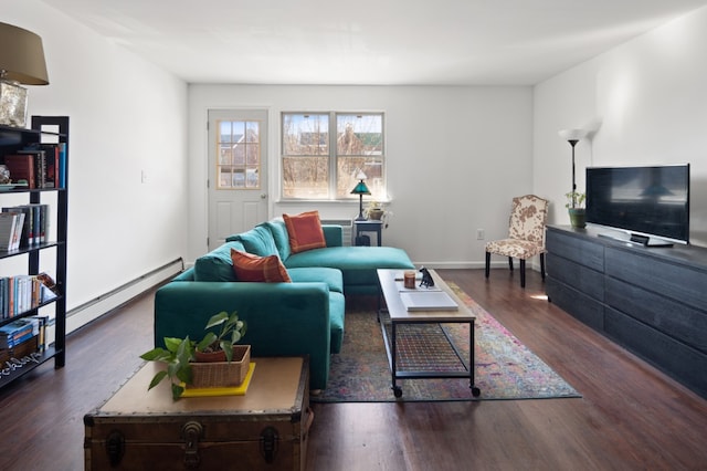 living room featuring dark hardwood / wood-style flooring and baseboard heating