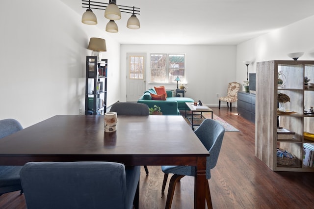 dining room featuring dark hardwood / wood-style flooring