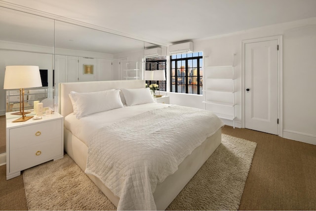 5 Tudor City Place Penthouse7, New York City, NY 10017 - carpeted bedroom with a wall unit AC and a wall mounted AC