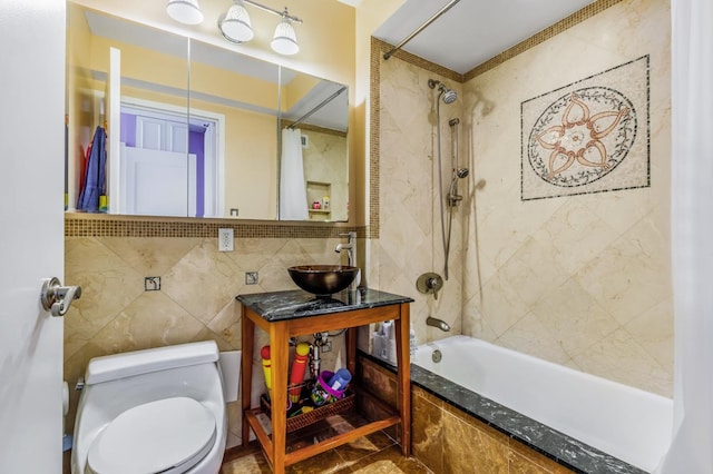 full bath with crown molding, vanity, tile walls, toilet, and shower / bath combo with shower curtain