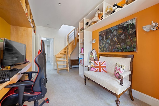 carpeted home office with crown molding