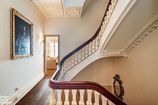 stairs featuring parquet floors