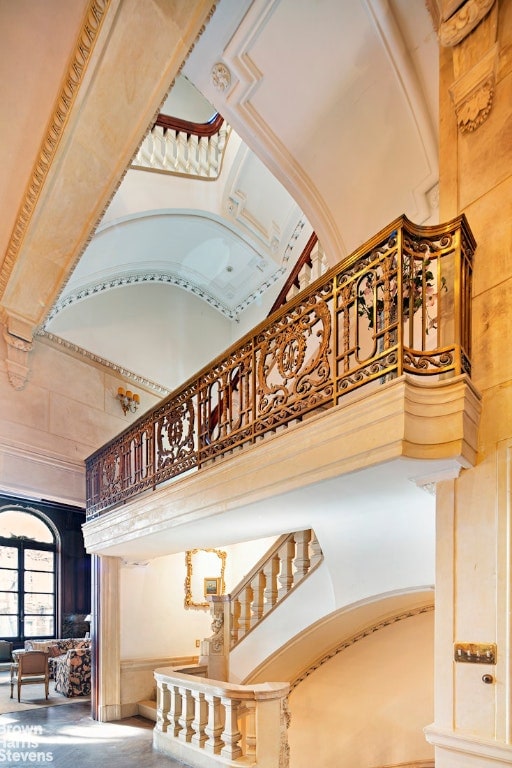 stairway with a high ceiling