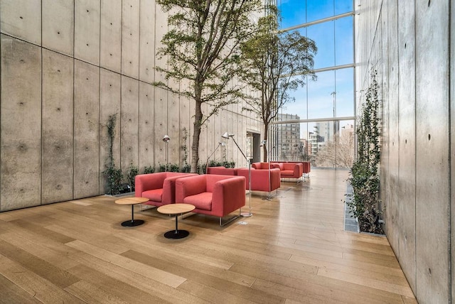 lobby with a high ceiling and expansive windows