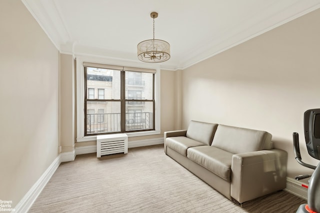 living room featuring baseboards, carpet floors, an inviting chandelier, and crown molding