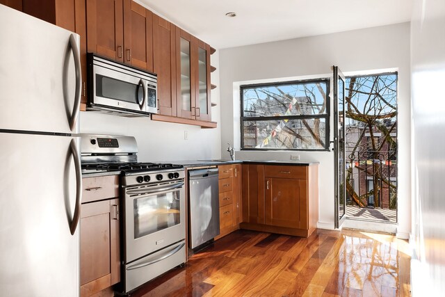 dining room with dark wood-type flooring and sink