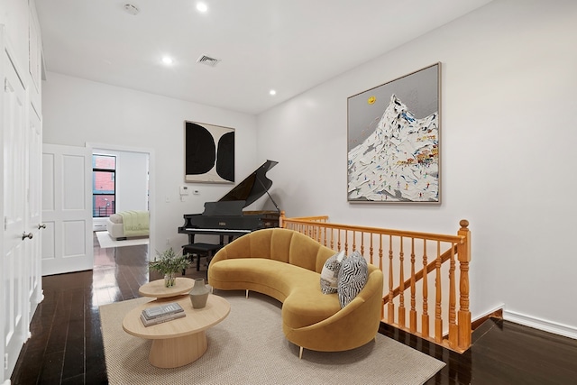 living area featuring dark hardwood / wood-style floors