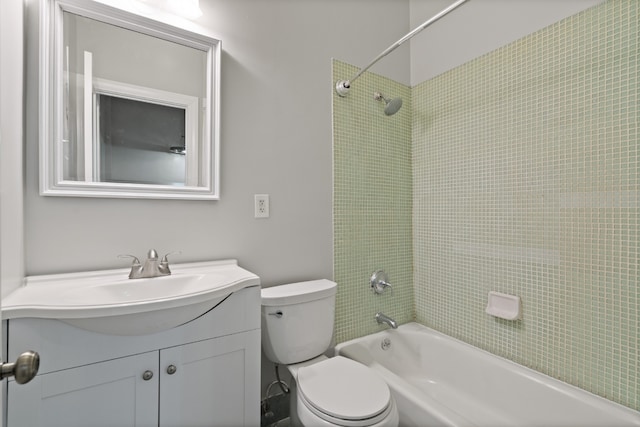 full bathroom featuring vanity, toilet, and tiled shower / bath combo