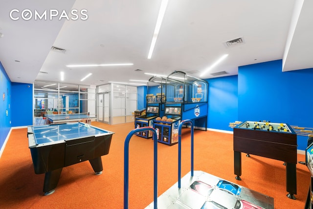 playroom with visible vents, baseboards, and carpet floors