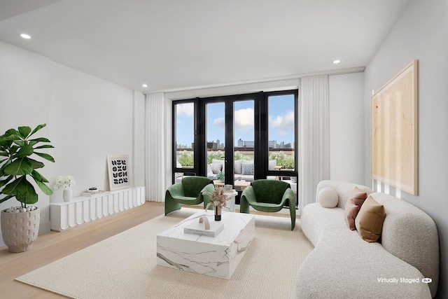 living room with light hardwood / wood-style floors