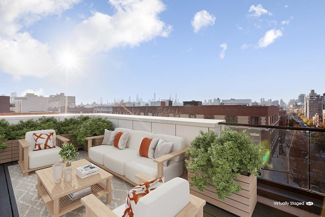 view of patio / terrace featuring an outdoor hangout area and a balcony