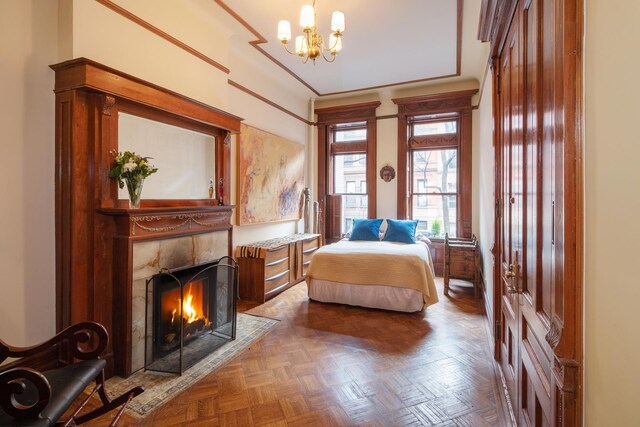 living room featuring a chandelier, coffered ceiling, and beamed ceiling