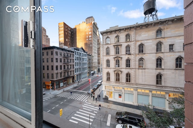 view of building exterior featuring a city view