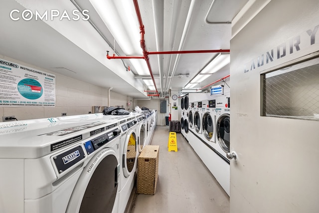 community laundry room with washer and dryer