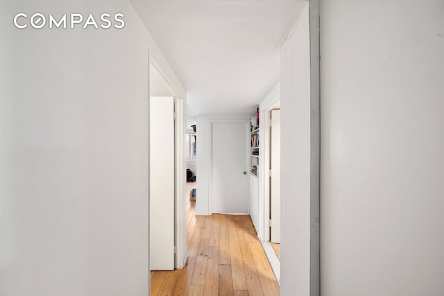 hallway featuring light wood finished floors