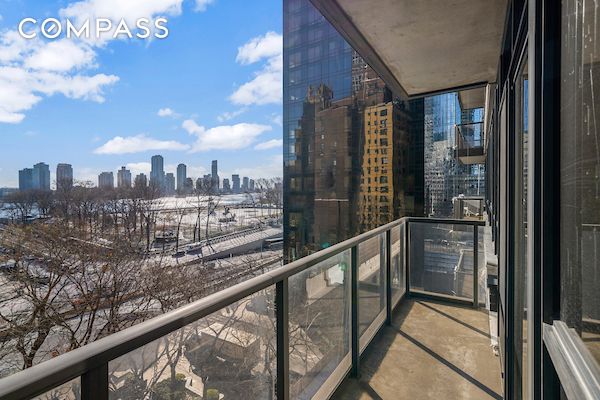 balcony featuring a view of city