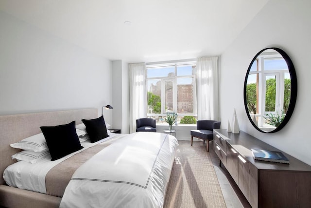 bedroom with light wood-style floors