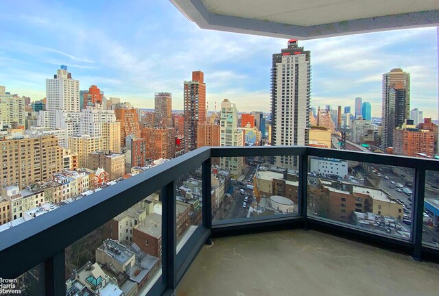 200 E 61st St Unit 23F, New York City, NY 10065 - balcony featuring a skyline view