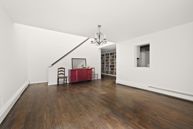 unfurnished living room featuring baseboards, a baseboard radiator, wood finished floors, a baseboard heating unit, and a chandelier