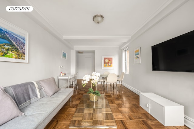 living room with dark parquet flooring and ornamental molding