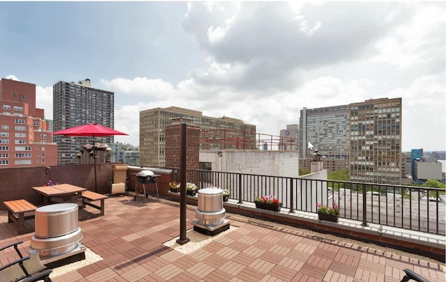 view of patio featuring a balcony