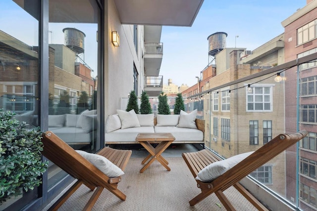 balcony featuring outdoor lounge area