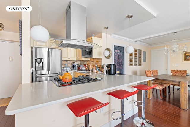 kitchen featuring dark wood-style flooring, a breakfast bar area, backsplash, appliances with stainless steel finishes, and island range hood