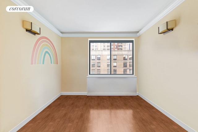 300 Rector Pl Unit 8Lm, New York City, NY 10280 - spare room featuring wood-type flooring, ornamental molding, and baseboards