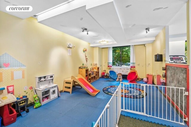 unfurnished room with wood-type flooring and ornamental molding